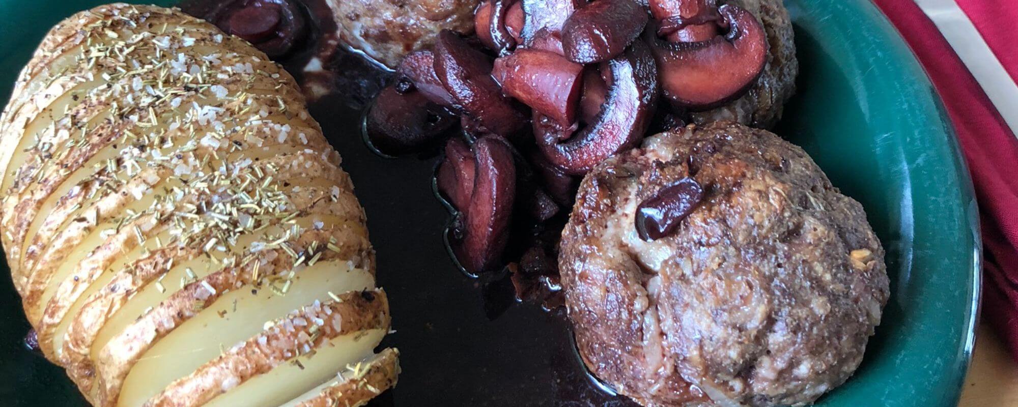 Gorgonzola-stuffed meatballs served with hasselback potatoes